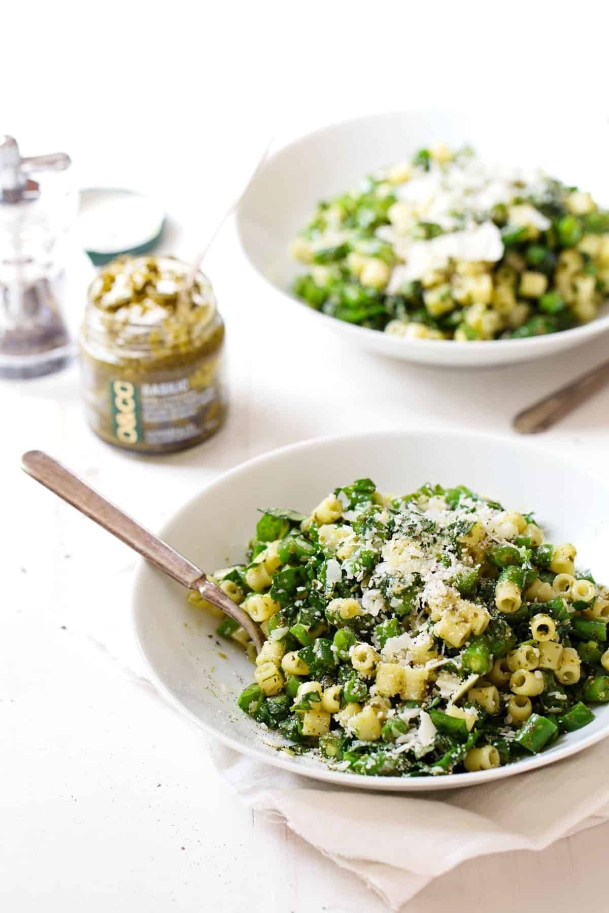 Green Pasta Salad on two plates.
