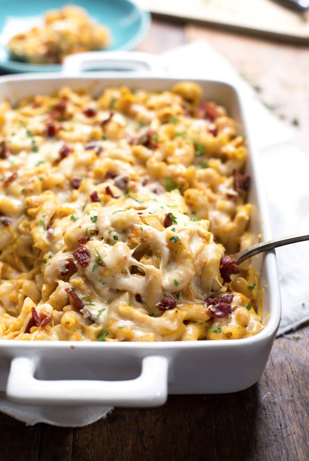 Chicken Bacon Pumpkin Pasta Bake in a white dish.