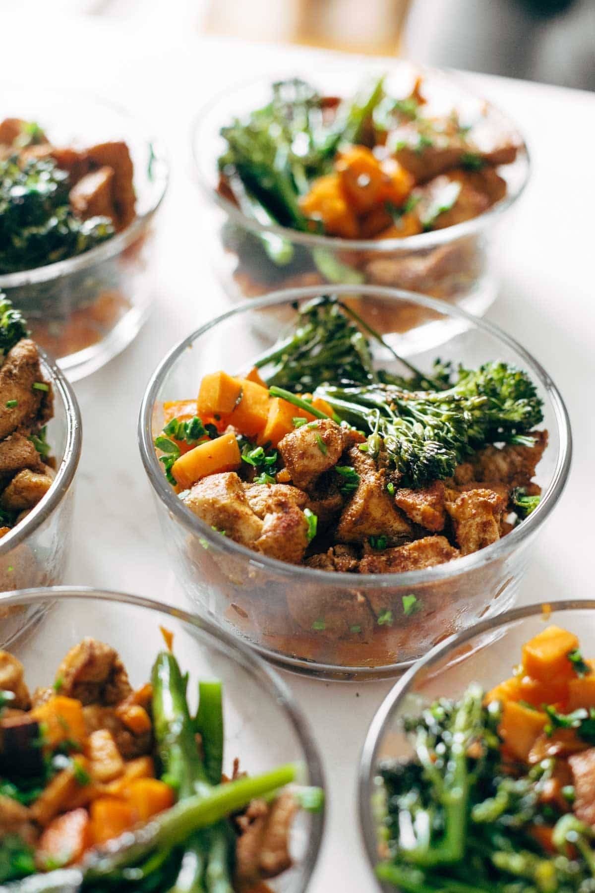 Sheet pan chicken in bowls.