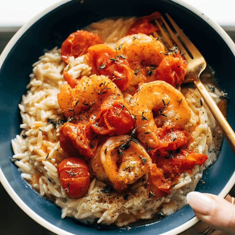 Shrimp and tomatoes on parmesan risotto.