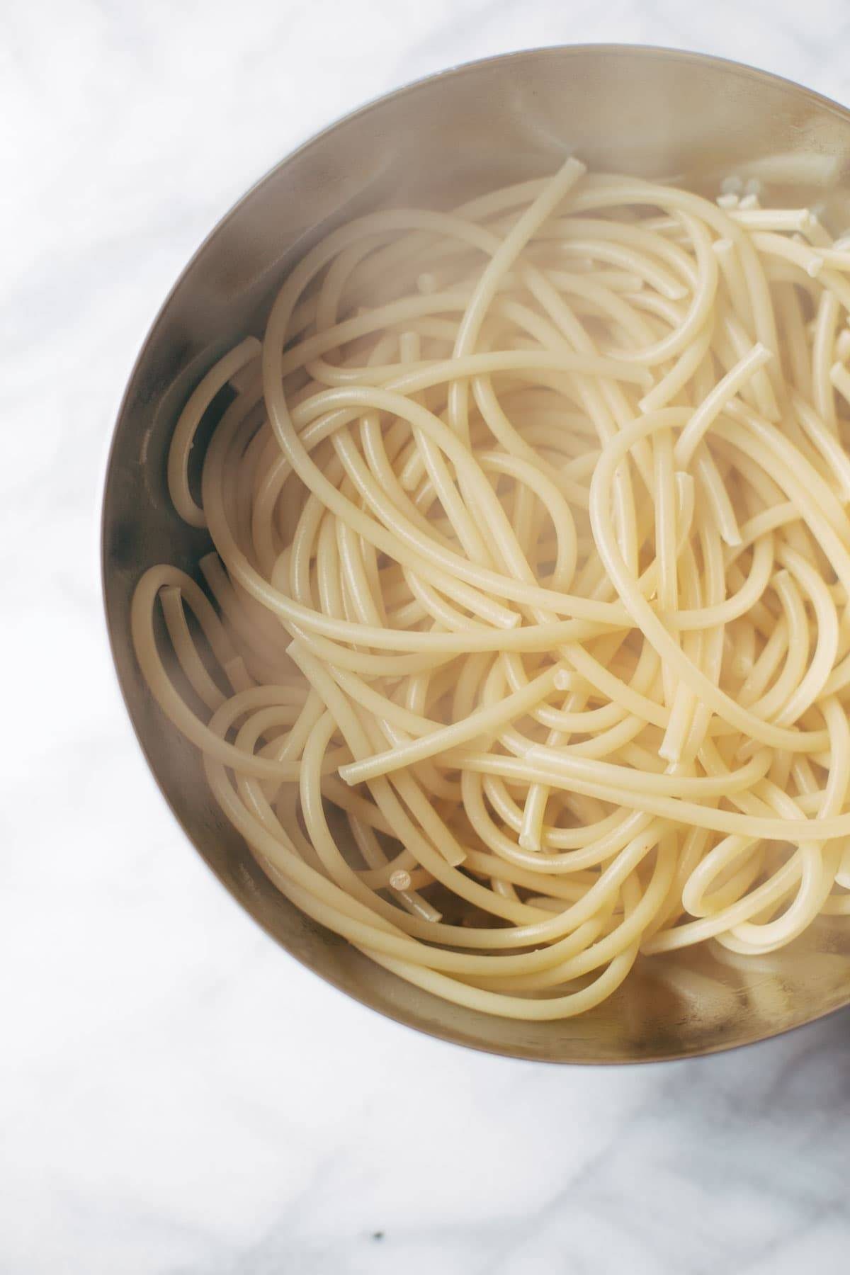 Creamy Pumpkin Spaghetti with Garlic Kale - this is the most crazy good combination! Spicy turkey, creamy pumpkin sauce, and pasta! | pinchofyum.com