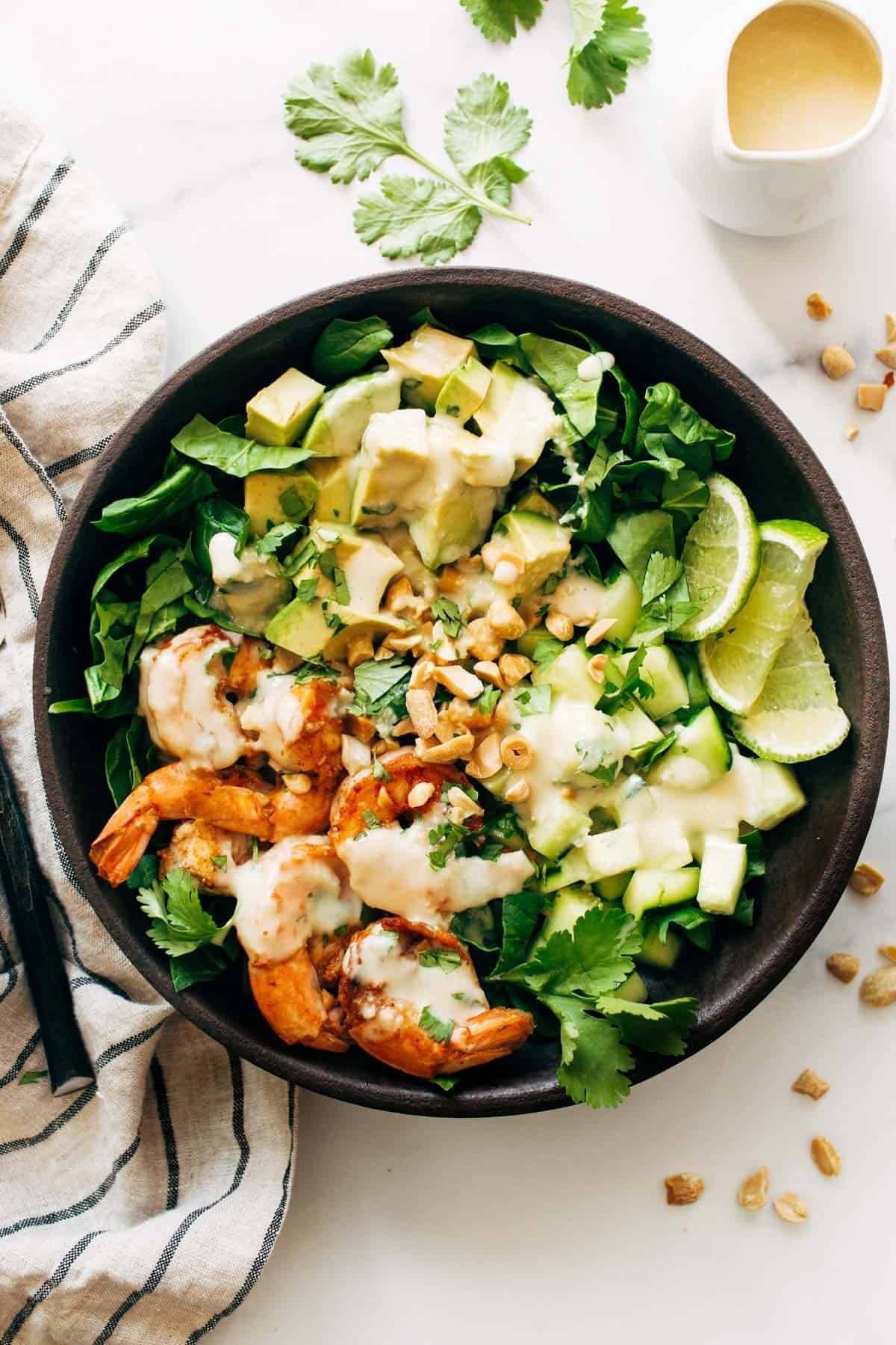 Shrimp and Avocado Salad with Miso Dressing in a Bowl.
