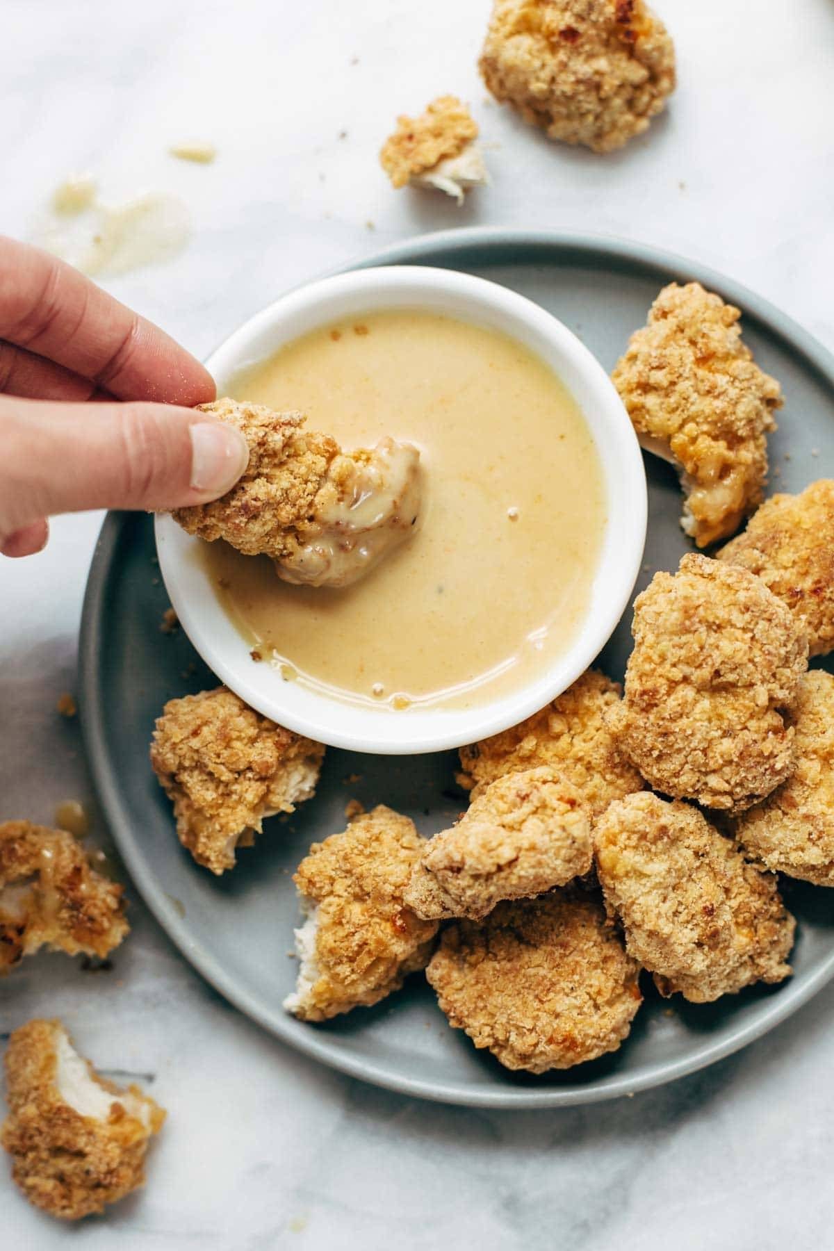 Everyone LOVES these! Baked popcorn chicken that tastes fried! Easy recipe, ready in 30 minutes. SO yummy and fun to share! | pinchofyum.com Everyone LOVES these! Baked popcorn chicken that tastes fried! Easy recipe, ready in 30 minutes. SO yummy and fun to share! | pinchofyum.com