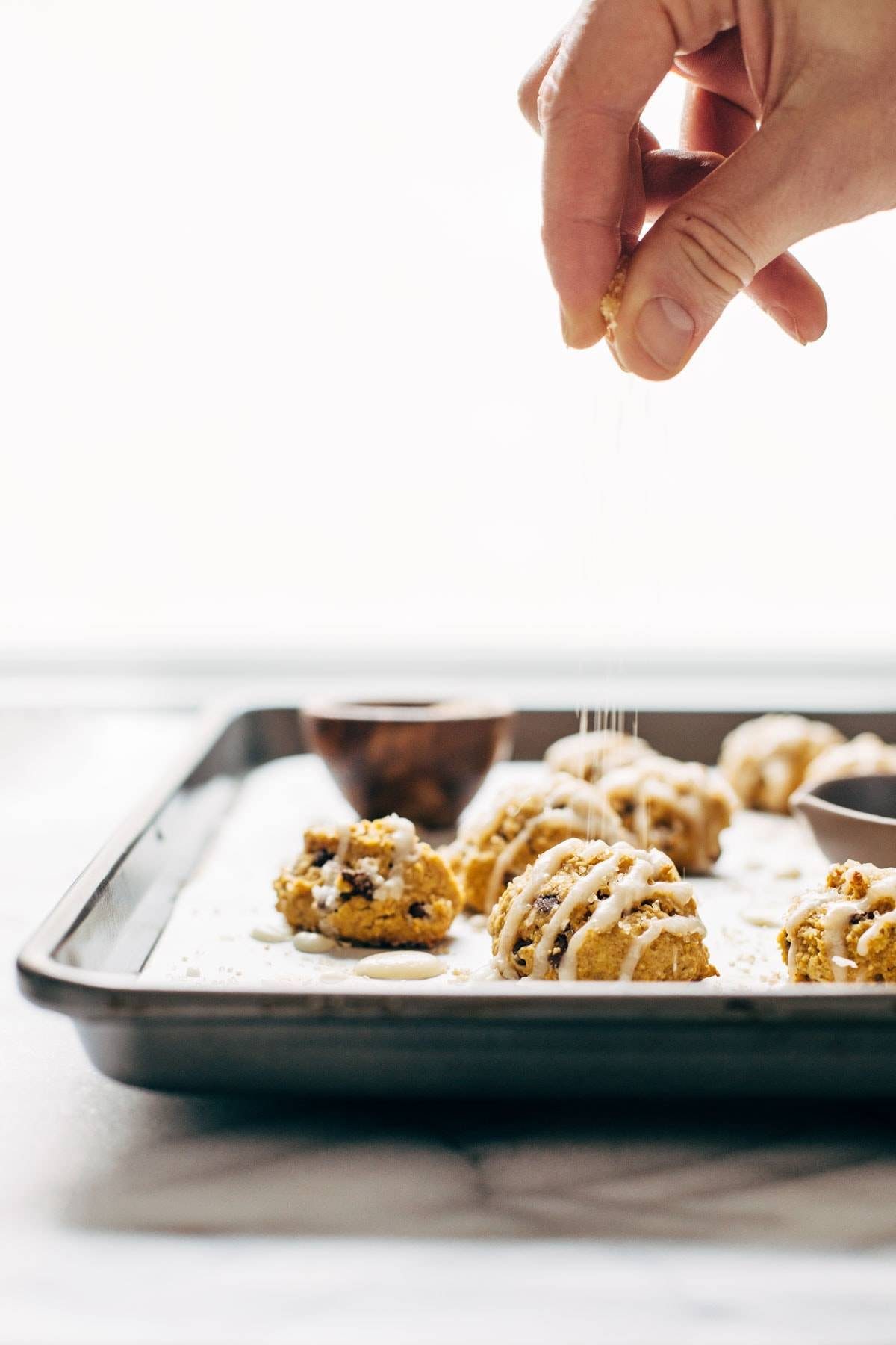 Pumpkin Bites with Maple Glaze are a MUST for pumpkin lovers! made with easy ingredients like oats, pumpkin, maple syrup, and olive oil. | pinchofyum.com
