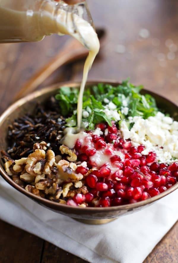 Kale salad with pomegranate, cheese, walnuts and wild rice.
