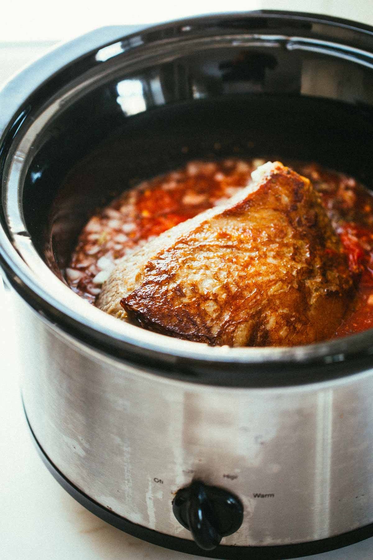 Beef in a crockpot.